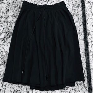 A modest black skirt